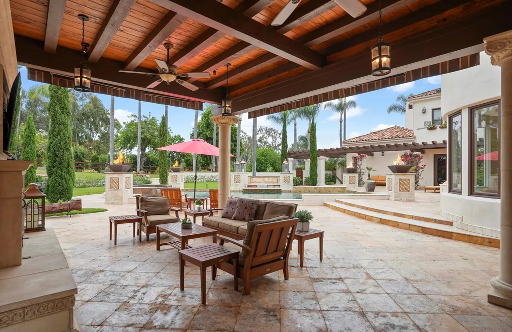 16756 Los Morros Home in Rancho Santa Fe, California. Explore this magnificent Mediterranean estate in Rancho Santa Fe's coveted Covenant. Situated on nearly two acres of lush grounds, this grand residence effortlessly combines opulence with a welcoming ambiance. With impressive features including a paradise pool, gourmet kitchen, spacious living areas, and luxurious amenities, this estate offers the epitome of refined living. Discover a luxurious retreat that seamlessly blends grandeur, comfort, and sophistication in one of Southern California's most prestigious neighborhoods.
