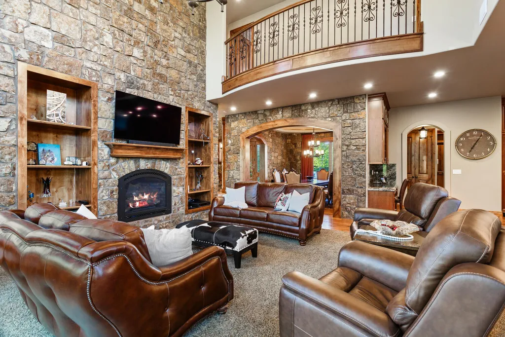 17476 West 69th Avenue Home in Arvada, Colorado. Step into a true work of art in this premier Arvada estate. Custom-built with meticulous attention to detail, this Old European-inspired home boasts luxury finishes, en-suite bedrooms, and high-tech smart home upgrades. Enjoy 7,614 sqft of living space, featuring a state-of-the-art home theater, gourmet kitchen, European sauna room, and more. 