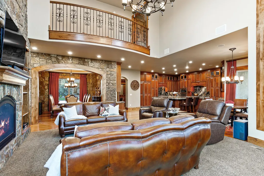 17476 West 69th Avenue Home in Arvada, Colorado. Step into a true work of art in this premier Arvada estate. Custom-built with meticulous attention to detail, this Old European-inspired home boasts luxury finishes, en-suite bedrooms, and high-tech smart home upgrades. Enjoy 7,614 sqft of living space, featuring a state-of-the-art home theater, gourmet kitchen, European sauna room, and more. 