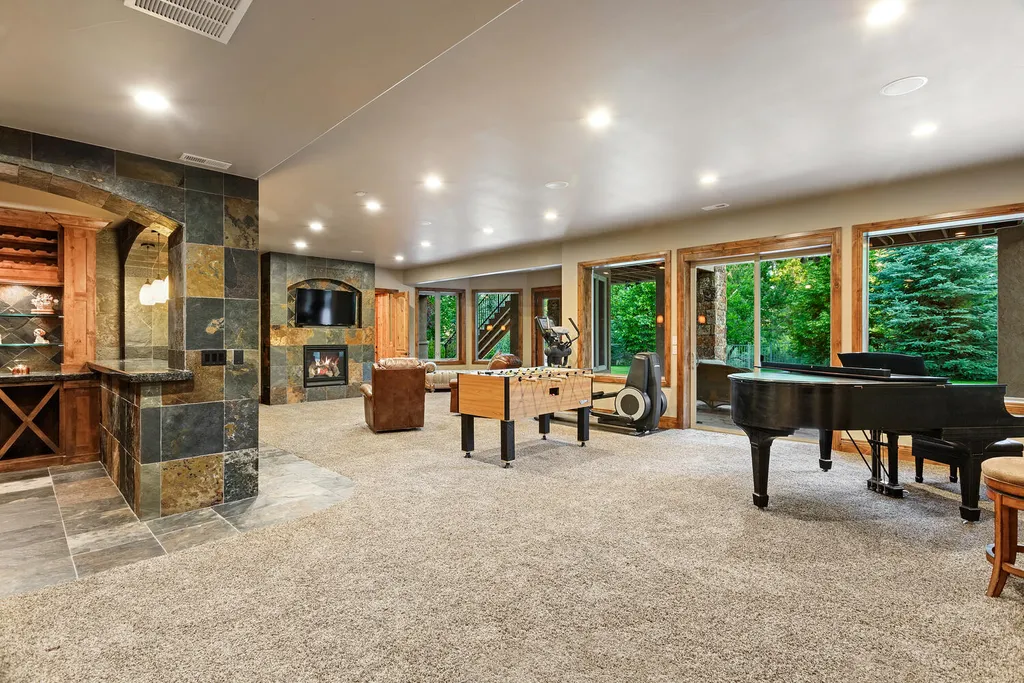 17476 West 69th Avenue Home in Arvada, Colorado. Step into a true work of art in this premier Arvada estate. Custom-built with meticulous attention to detail, this Old European-inspired home boasts luxury finishes, en-suite bedrooms, and high-tech smart home upgrades. Enjoy 7,614 sqft of living space, featuring a state-of-the-art home theater, gourmet kitchen, European sauna room, and more. 