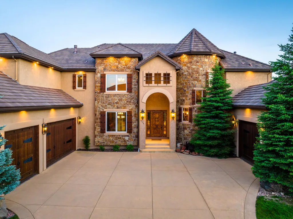 17476 West 69th Avenue Home in Arvada, Colorado. Step into a true work of art in this premier Arvada estate. Custom-built with meticulous attention to detail, this Old European-inspired home boasts luxury finishes, en-suite bedrooms, and high-tech smart home upgrades. Enjoy 7,614 sqft of living space, featuring a state-of-the-art home theater, gourmet kitchen, European sauna room, and more. 