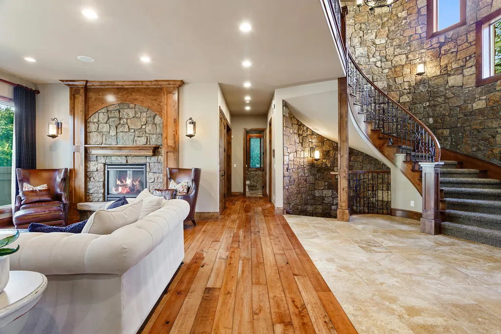 17476 West 69th Avenue Home in Arvada, Colorado. Step into a true work of art in this premier Arvada estate. Custom-built with meticulous attention to detail, this Old European-inspired home boasts luxury finishes, en-suite bedrooms, and high-tech smart home upgrades. Enjoy 7,614 sqft of living space, featuring a state-of-the-art home theater, gourmet kitchen, European sauna room, and more. 