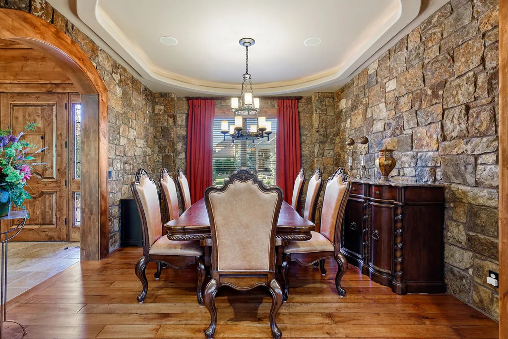 17476 West 69th Avenue Home in Arvada, Colorado. Step into a true work of art in this premier Arvada estate. Custom-built with meticulous attention to detail, this Old European-inspired home boasts luxury finishes, en-suite bedrooms, and high-tech smart home upgrades. Enjoy 7,614 sqft of living space, featuring a state-of-the-art home theater, gourmet kitchen, European sauna room, and more. 