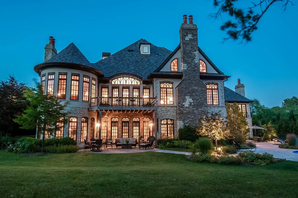 2 Rock Ridge Road Home in Barrington, Illinois. Discover the beauty of this one-of-a-kind estate in Barrington Hills, situated on 12.3 acres of picturesque land. This stunning home showcases expert craftsmanship, finest materials, and luxurious amenities. 