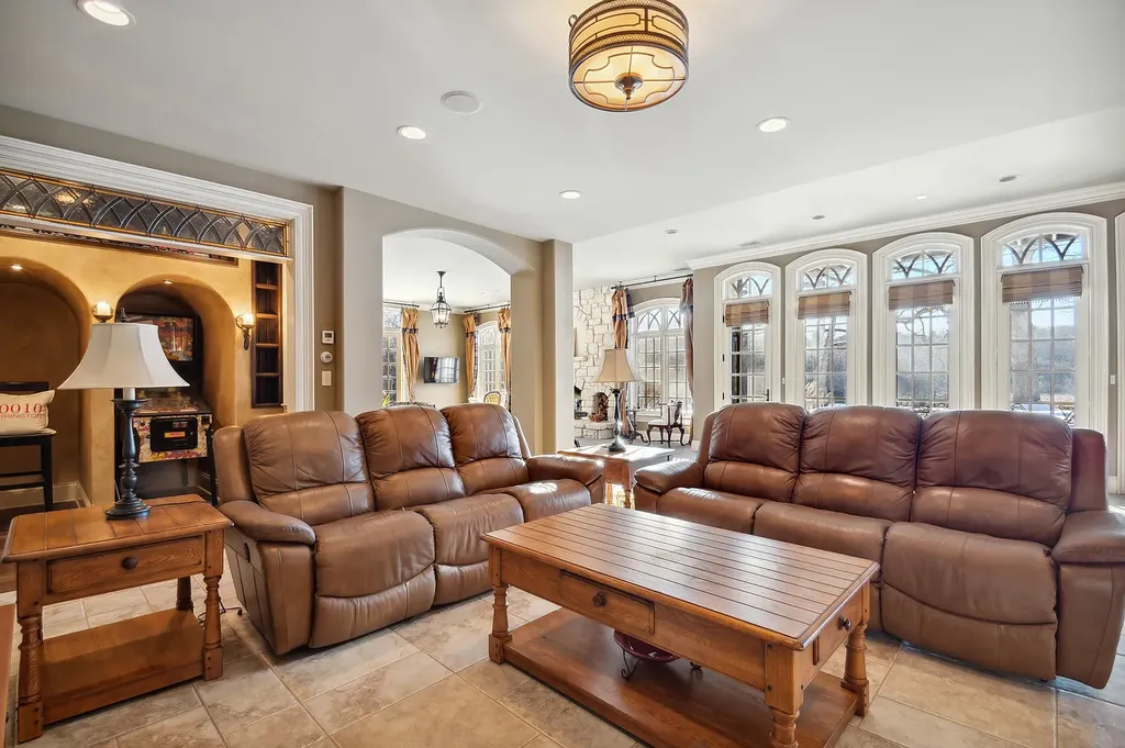 2 Rock Ridge Road Home in Barrington, Illinois. Discover the beauty of this one-of-a-kind estate in Barrington Hills, situated on 12.3 acres of picturesque land. This stunning home showcases expert craftsmanship, finest materials, and luxurious amenities. 