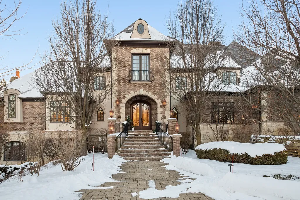 2 Rock Ridge Road Home in Barrington, Illinois. Discover the beauty of this one-of-a-kind estate in Barrington Hills, situated on 12.3 acres of picturesque land. This stunning home showcases expert craftsmanship, finest materials, and luxurious amenities. 