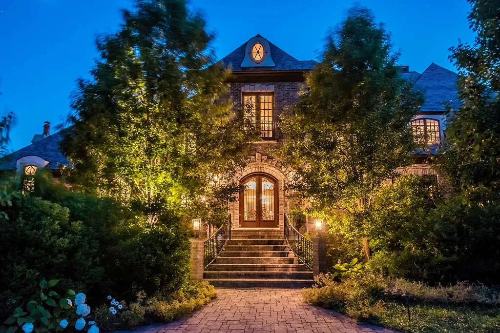 2 Rock Ridge Road Home in Barrington, Illinois. Discover the beauty of this one-of-a-kind estate in Barrington Hills, situated on 12.3 acres of picturesque land. This stunning home showcases expert craftsmanship, finest materials, and luxurious amenities. 