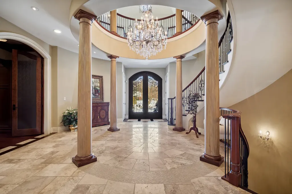 2 Rock Ridge Road Home in Barrington, Illinois. Discover the beauty of this one-of-a-kind estate in Barrington Hills, situated on 12.3 acres of picturesque land. This stunning home showcases expert craftsmanship, finest materials, and luxurious amenities. 