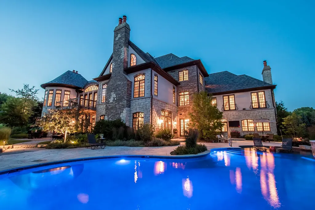 2 Rock Ridge Road Home in Barrington, Illinois. Discover the beauty of this one-of-a-kind estate in Barrington Hills, situated on 12.3 acres of picturesque land. This stunning home showcases expert craftsmanship, finest materials, and luxurious amenities. 