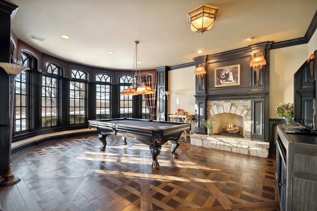 2 Rock Ridge Road Home in Barrington, Illinois. Discover the beauty of this one-of-a-kind estate in Barrington Hills, situated on 12.3 acres of picturesque land. This stunning home showcases expert craftsmanship, finest materials, and luxurious amenities. 
