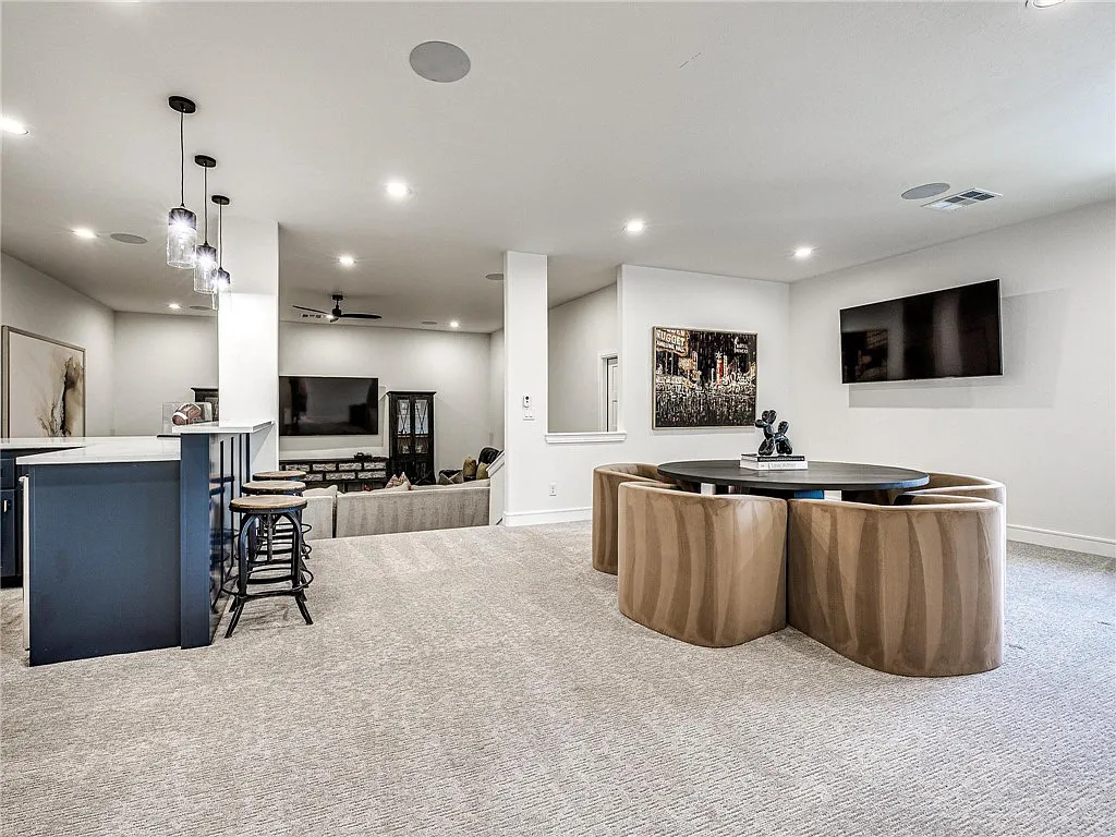3108 Blackstone Drive Home in Edmond, Oklahoma. Welcome to your dream oasis! Prepare to be captivated by this extraordinary home, encompassing over 7,300 square feet of unparalleled luxury and exquisite designer finishes. Every detail has been meticulously crafted to create a space that will leave you in awe.