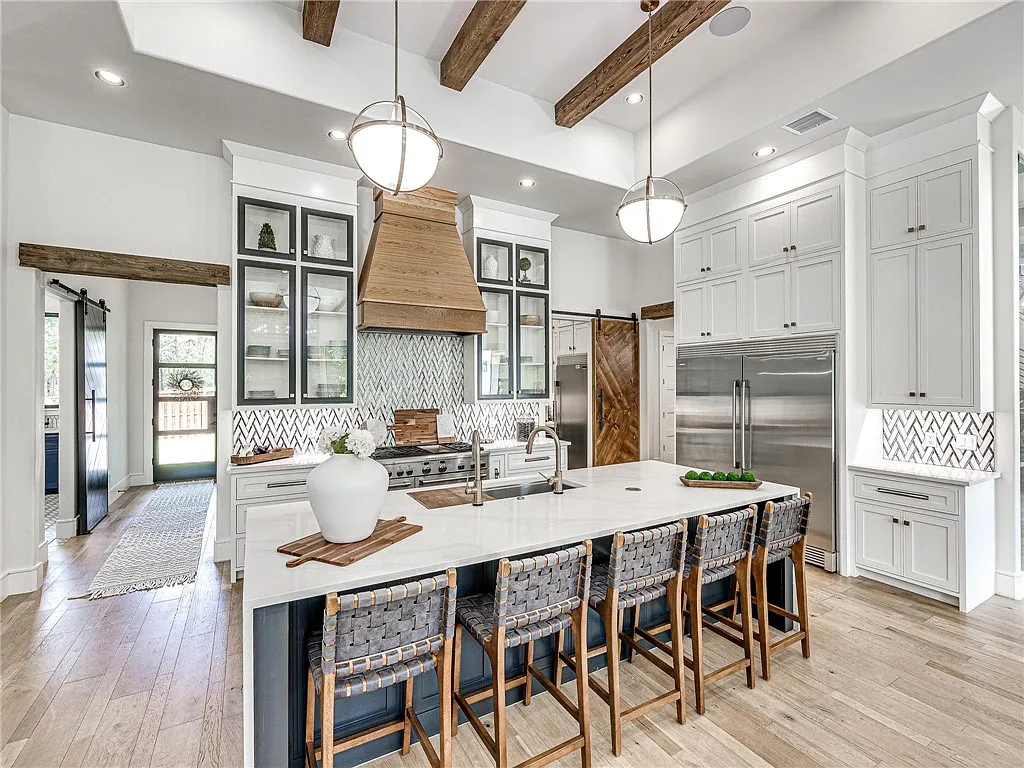 3108 Blackstone Drive Home in Edmond, Oklahoma. Welcome to your dream oasis! Prepare to be captivated by this extraordinary home, encompassing over 7,300 square feet of unparalleled luxury and exquisite designer finishes. Every detail has been meticulously crafted to create a space that will leave you in awe.