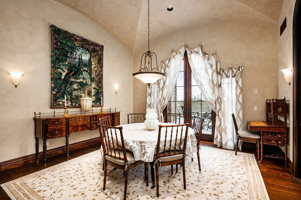 41781 N 99th Way Home in Scottsdale, Arizona. Explore this splendid Old World estate with GOLF Membership available, showcasing warmth, comfort, and unparalleled quality. From the intricately designed interiors to the resort-style patio and serene view terrace, every detail exudes thoughtful craftsmanship and fine materials. 