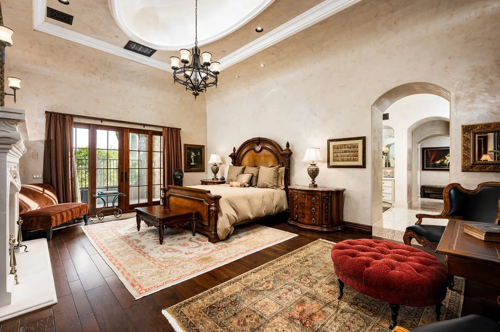 41781 N 99th Way Home in Scottsdale, Arizona. Explore this splendid Old World estate with GOLF Membership available, showcasing warmth, comfort, and unparalleled quality. From the intricately designed interiors to the resort-style patio and serene view terrace, every detail exudes thoughtful craftsmanship and fine materials. 