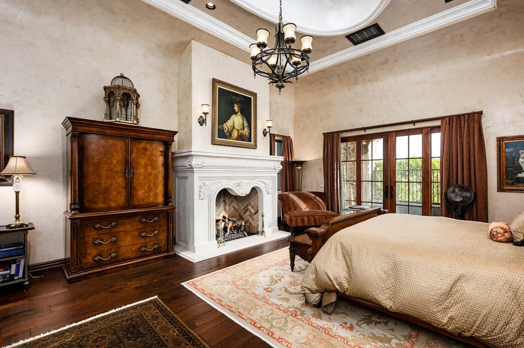41781 N 99th Way Home in Scottsdale, Arizona. Explore this splendid Old World estate with GOLF Membership available, showcasing warmth, comfort, and unparalleled quality. From the intricately designed interiors to the resort-style patio and serene view terrace, every detail exudes thoughtful craftsmanship and fine materials. 