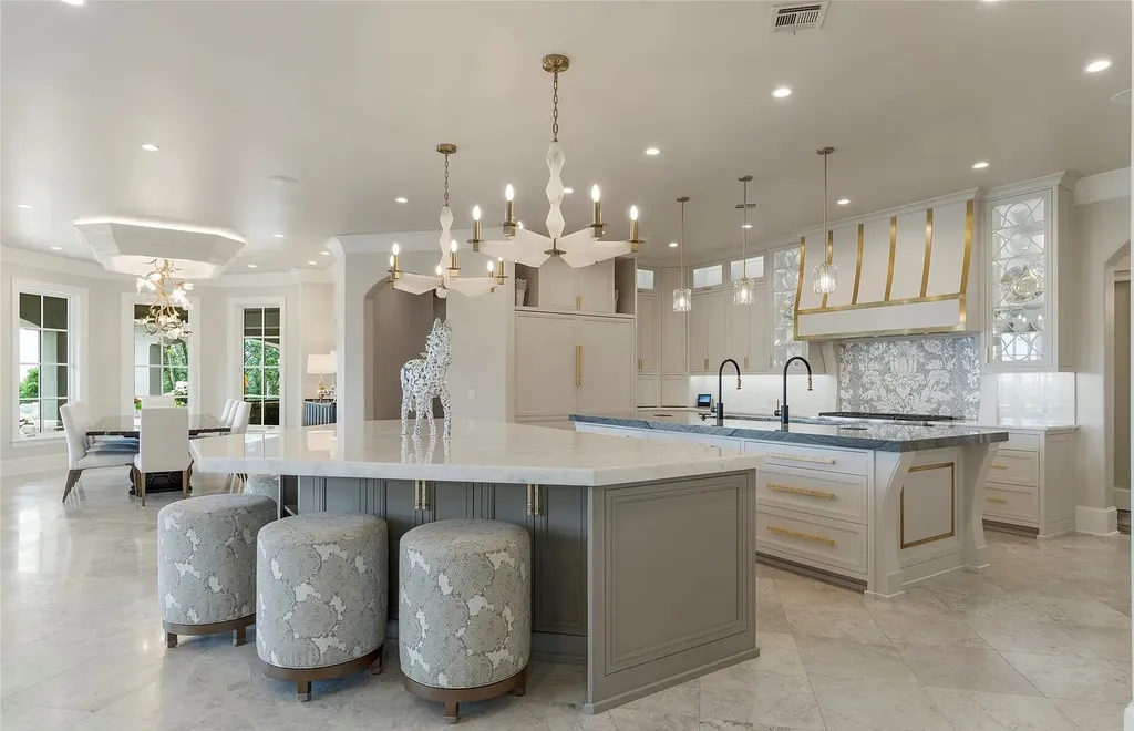 5862 North Eagle Summit Road Home in Owasso, Oklahoma. Step into luxury with this exceptional mansion in the prestigious Bluffs at Stone Canyon. Featuring a grand entry foyer, artistic half baths, a spacious Great Room with a fireplace, and a stunning Master Suite offering breathtaking views and a luxurious spa bath, this home epitomizes elegance. Enjoy the convenience of multiple laundry rooms, a gourmet kitchen with high-end appliances, two Executive Office Suites, a game room with a wet bar and theater room, and three additional bedrooms with private baths.