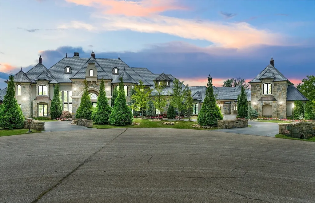 5862 North Eagle Summit Road Home in Owasso, Oklahoma. Step into luxury with this exceptional mansion in the prestigious Bluffs at Stone Canyon. Featuring a grand entry foyer, artistic half baths, a spacious Great Room with a fireplace, and a stunning Master Suite offering breathtaking views and a luxurious spa bath, this home epitomizes elegance. Enjoy the convenience of multiple laundry rooms, a gourmet kitchen with high-end appliances, two Executive Office Suites, a game room with a wet bar and theater room, and three additional bedrooms with private baths.