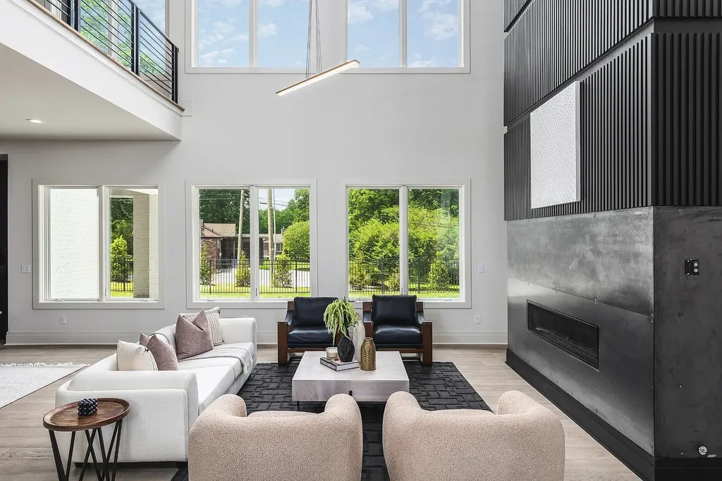 6240 Bresslyn Road Home in Nashville, Tennessee. Province Builders LLC & Laura Greene Interiors have created a stunning contemporary masterpiece on a spacious one-acre lot in the desirable West Meade neighborhood. This home showcases impeccable attention to detail and a tasteful blend of sophistication and modernity. 