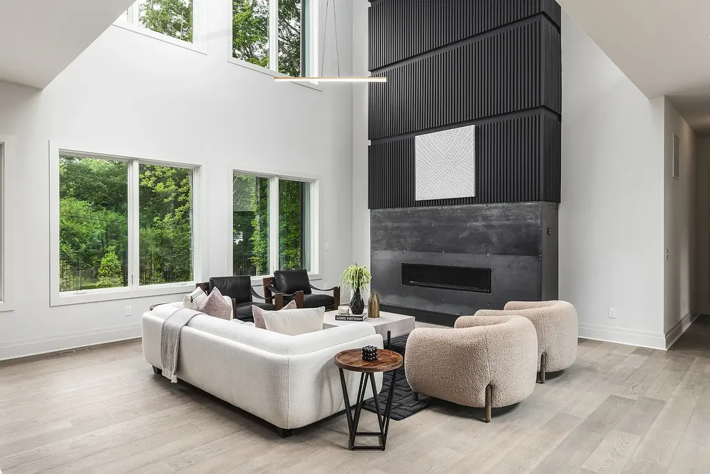 6240 Bresslyn Road Home in Nashville, Tennessee. Province Builders LLC & Laura Greene Interiors have created a stunning contemporary masterpiece on a spacious one-acre lot in the desirable West Meade neighborhood. This home showcases impeccable attention to detail and a tasteful blend of sophistication and modernity. 
