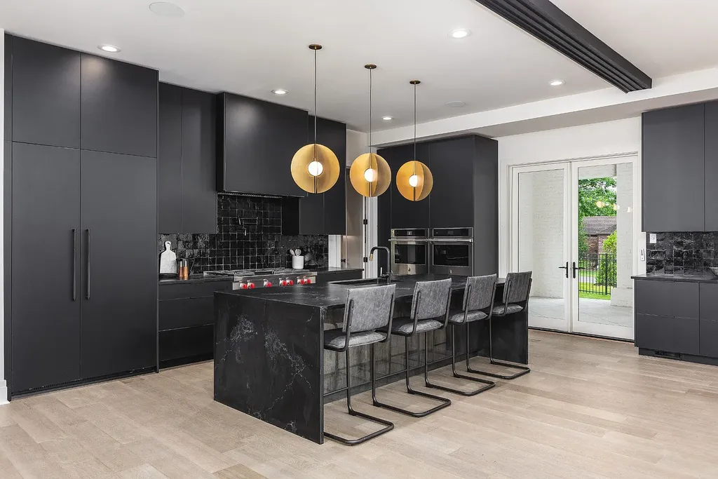 6240 Bresslyn Road Home in Nashville, Tennessee. Province Builders LLC & Laura Greene Interiors have created a stunning contemporary masterpiece on a spacious one-acre lot in the desirable West Meade neighborhood. This home showcases impeccable attention to detail and a tasteful blend of sophistication and modernity. 