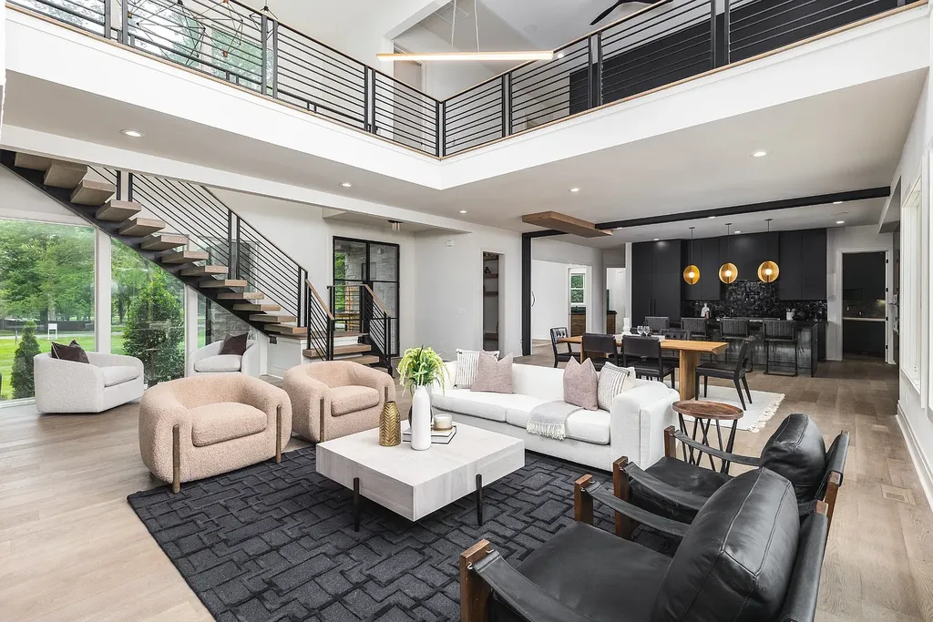 6240 Bresslyn Road Home in Nashville, Tennessee. Province Builders LLC & Laura Greene Interiors have created a stunning contemporary masterpiece on a spacious one-acre lot in the desirable West Meade neighborhood. This home showcases impeccable attention to detail and a tasteful blend of sophistication and modernity. 