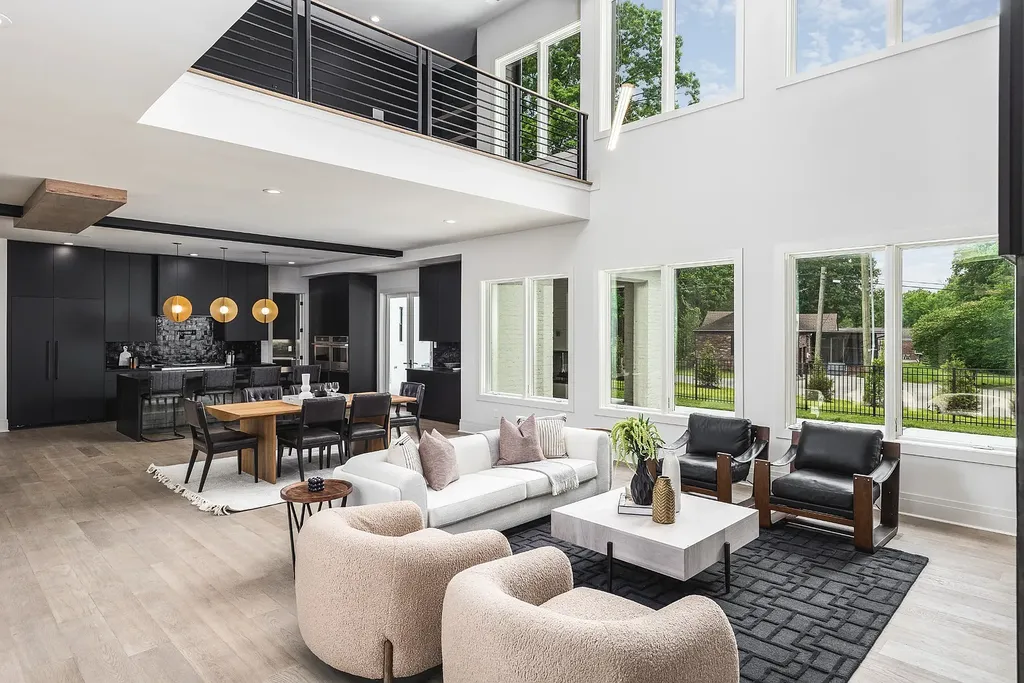 6240 Bresslyn Road Home in Nashville, Tennessee. Province Builders LLC & Laura Greene Interiors have created a stunning contemporary masterpiece on a spacious one-acre lot in the desirable West Meade neighborhood. This home showcases impeccable attention to detail and a tasteful blend of sophistication and modernity. 