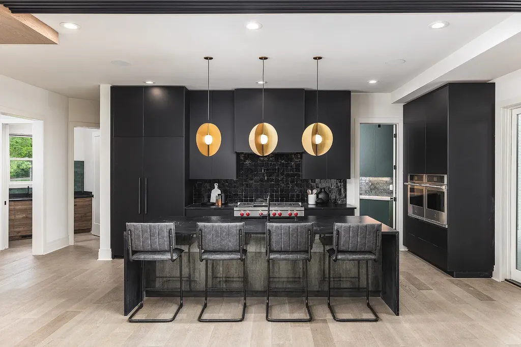 6240 Bresslyn Road Home in Nashville, Tennessee. Province Builders LLC & Laura Greene Interiors have created a stunning contemporary masterpiece on a spacious one-acre lot in the desirable West Meade neighborhood. This home showcases impeccable attention to detail and a tasteful blend of sophistication and modernity. 