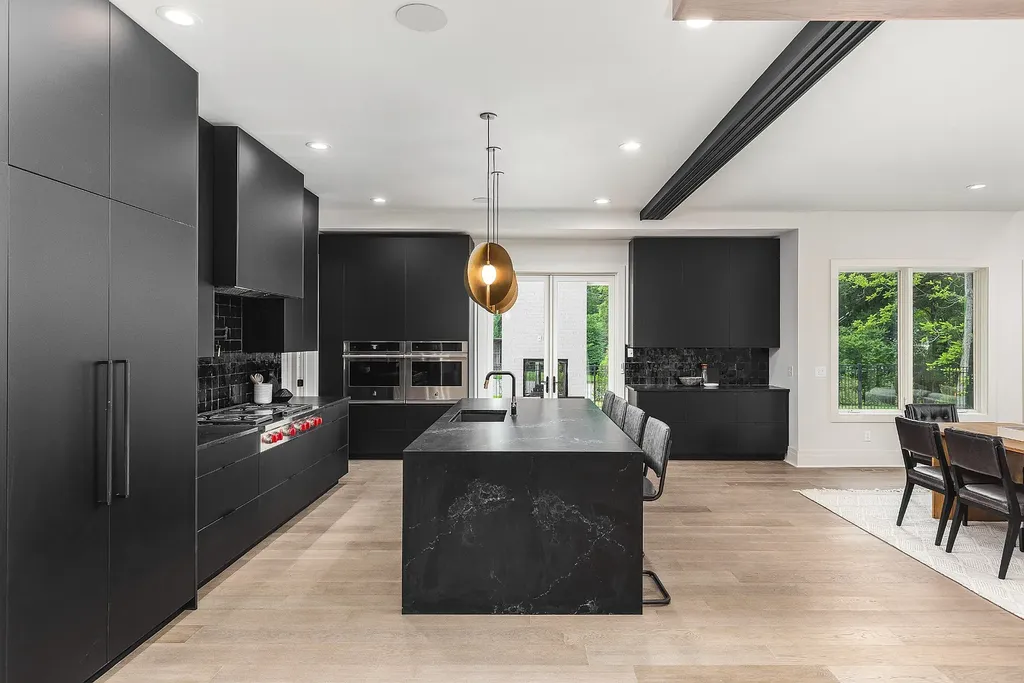 6240 Bresslyn Road Home in Nashville, Tennessee. Province Builders LLC & Laura Greene Interiors have created a stunning contemporary masterpiece on a spacious one-acre lot in the desirable West Meade neighborhood. This home showcases impeccable attention to detail and a tasteful blend of sophistication and modernity. 