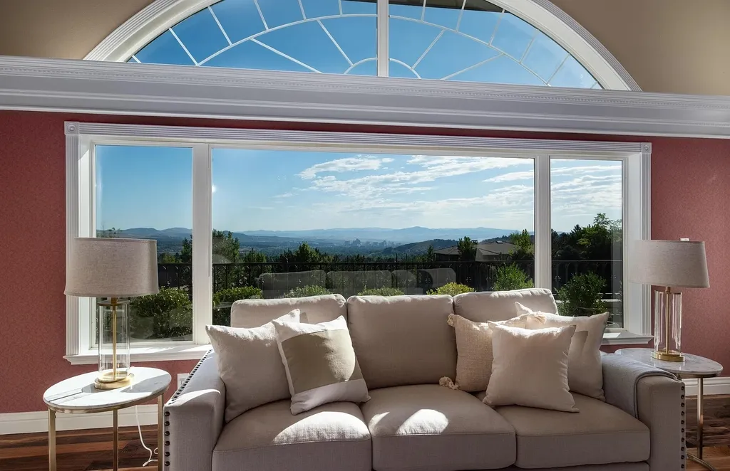 Discover the exquisite luxury of Eagle's Nest, a unique and meticulously designed estate in the prestigious gated community. Enjoy panoramic views, soaring ceilings, and a perfect blend of modern comfort and timeless elegance. This magnificent property features a chef's kitchen, a wine cellar, a resort-style pool area, and much more. 