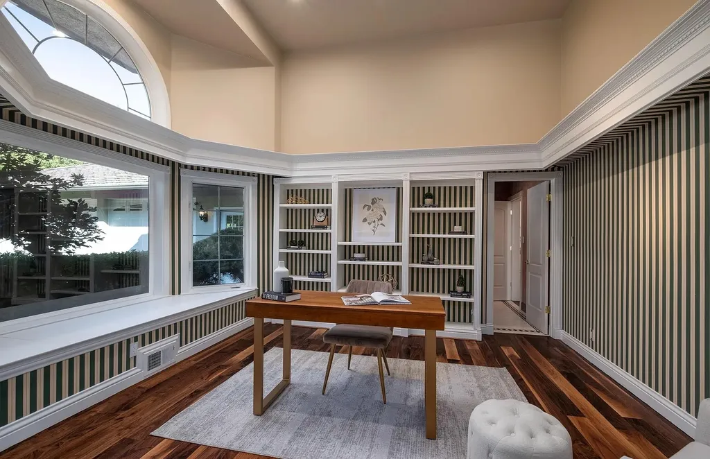 Discover the exquisite luxury of Eagle's Nest, a unique and meticulously designed estate in the prestigious gated community. Enjoy panoramic views, soaring ceilings, and a perfect blend of modern comfort and timeless elegance. This magnificent property features a chef's kitchen, a wine cellar, a resort-style pool area, and much more. 