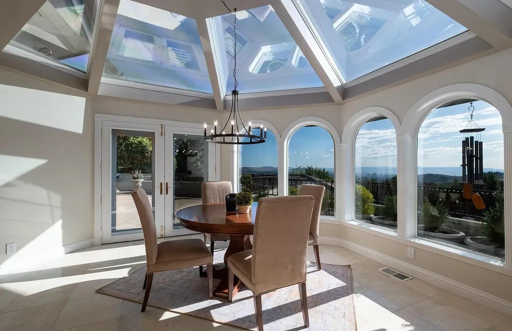 Discover the exquisite luxury of Eagle's Nest, a unique and meticulously designed estate in the prestigious gated community. Enjoy panoramic views, soaring ceilings, and a perfect blend of modern comfort and timeless elegance. This magnificent property features a chef's kitchen, a wine cellar, a resort-style pool area, and much more. 