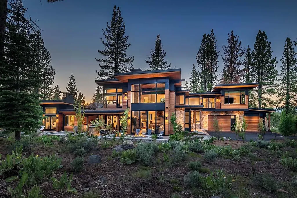 9601 Dunsmuir Way Home in Truckee, California. Immerse yourself in the tranquility of this exquisite Martis Camp home, boasting panoramic mountain views and luxurious amenities. Wake up to breathtaking sunrises, enjoy the open great room with its stunning architecture, and indulge in the state-of-the-art kitchen and spacious living areas. With five bedrooms, a hot tub patio, and proximity to skiing and tennis facilities, this retreat offers a perfect balance of serenity and convenience. Experience mountain living at its finest in this stylishly designed home nestled amidst the natural beauty of Martis Camp.