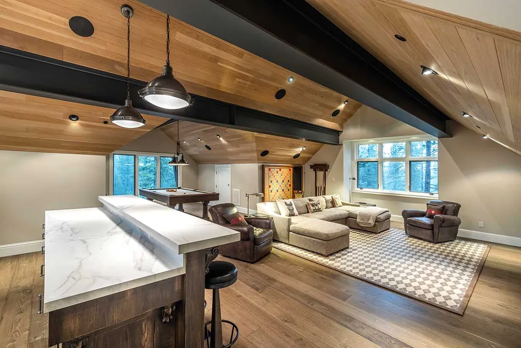 9661 Dunsmuir Way Home in Truckee, California. Prepare to be captivated as you step through the front door of this extraordinary 7,546-square-foot modern mountain home in Martis Camp. The first glimpse is nothing short of awe-inspiring—a vast expanse of glass that serves as both a wall and a stunning 288-bottle wine cellar. This artistic flair extends throughout the 6-bedroom, 7-bathroom residence, creating a truly unique and rewarding living experience.