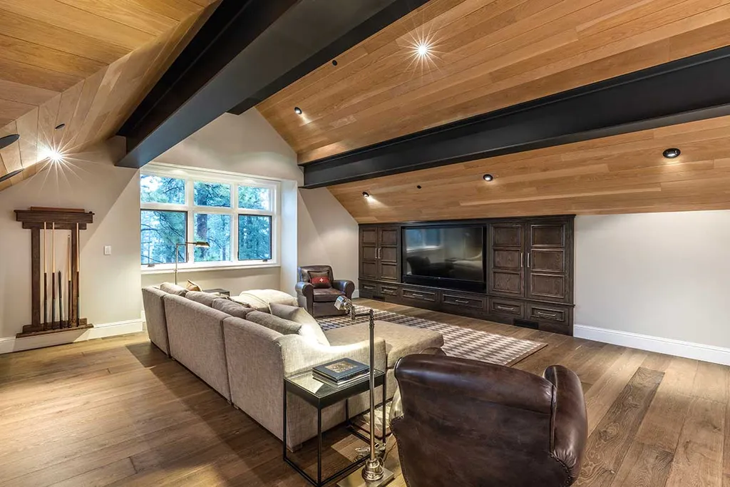 9661 Dunsmuir Way Home in Truckee, California. Prepare to be captivated as you step through the front door of this extraordinary 7,546-square-foot modern mountain home in Martis Camp. The first glimpse is nothing short of awe-inspiring—a vast expanse of glass that serves as both a wall and a stunning 288-bottle wine cellar. This artistic flair extends throughout the 6-bedroom, 7-bathroom residence, creating a truly unique and rewarding living experience.