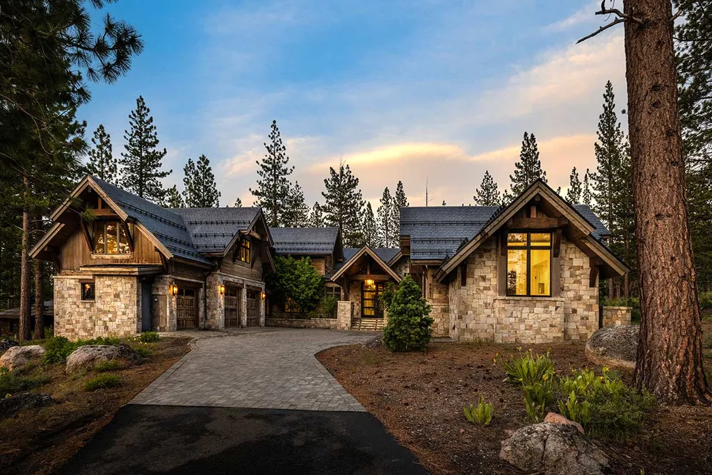 9661 Dunsmuir Way Home in Truckee, California. Prepare to be captivated as you step through the front door of this extraordinary 7,546-square-foot modern mountain home in Martis Camp. The first glimpse is nothing short of awe-inspiring—a vast expanse of glass that serves as both a wall and a stunning 288-bottle wine cellar. This artistic flair extends throughout the 6-bedroom, 7-bathroom residence, creating a truly unique and rewarding living experience.