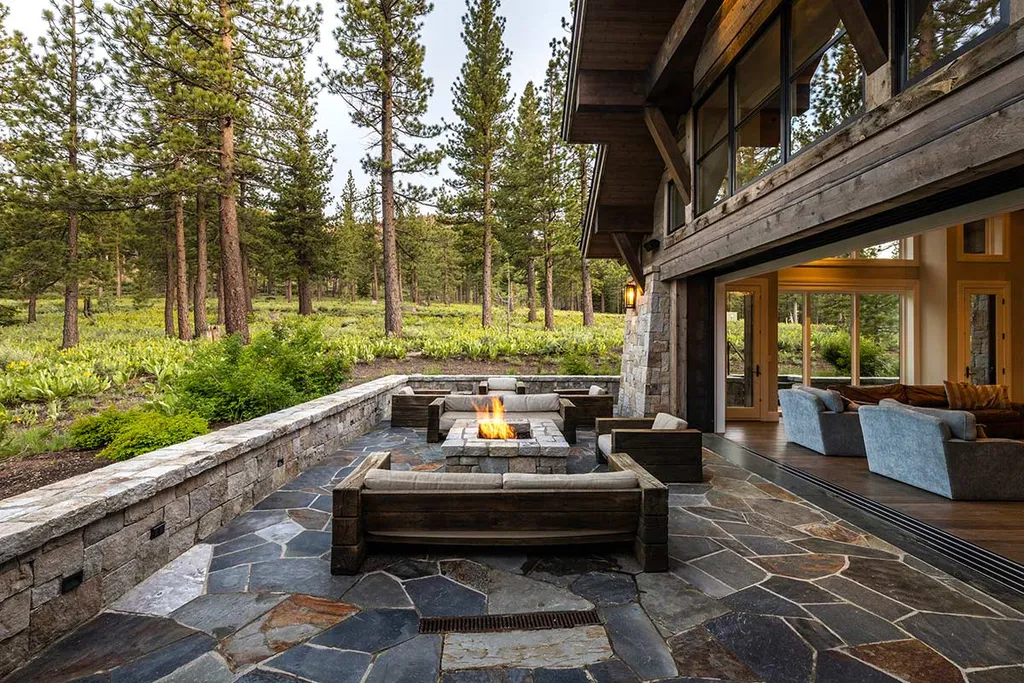 9661 Dunsmuir Way Home in Truckee, California. Prepare to be captivated as you step through the front door of this extraordinary 7,546-square-foot modern mountain home in Martis Camp. The first glimpse is nothing short of awe-inspiring—a vast expanse of glass that serves as both a wall and a stunning 288-bottle wine cellar. This artistic flair extends throughout the 6-bedroom, 7-bathroom residence, creating a truly unique and rewarding living experience.