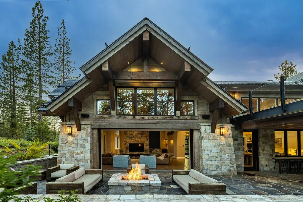 9661 Dunsmuir Way Home in Truckee, California. Prepare to be captivated as you step through the front door of this extraordinary 7,546-square-foot modern mountain home in Martis Camp. The first glimpse is nothing short of awe-inspiring—a vast expanse of glass that serves as both a wall and a stunning 288-bottle wine cellar. This artistic flair extends throughout the 6-bedroom, 7-bathroom residence, creating a truly unique and rewarding living experience.