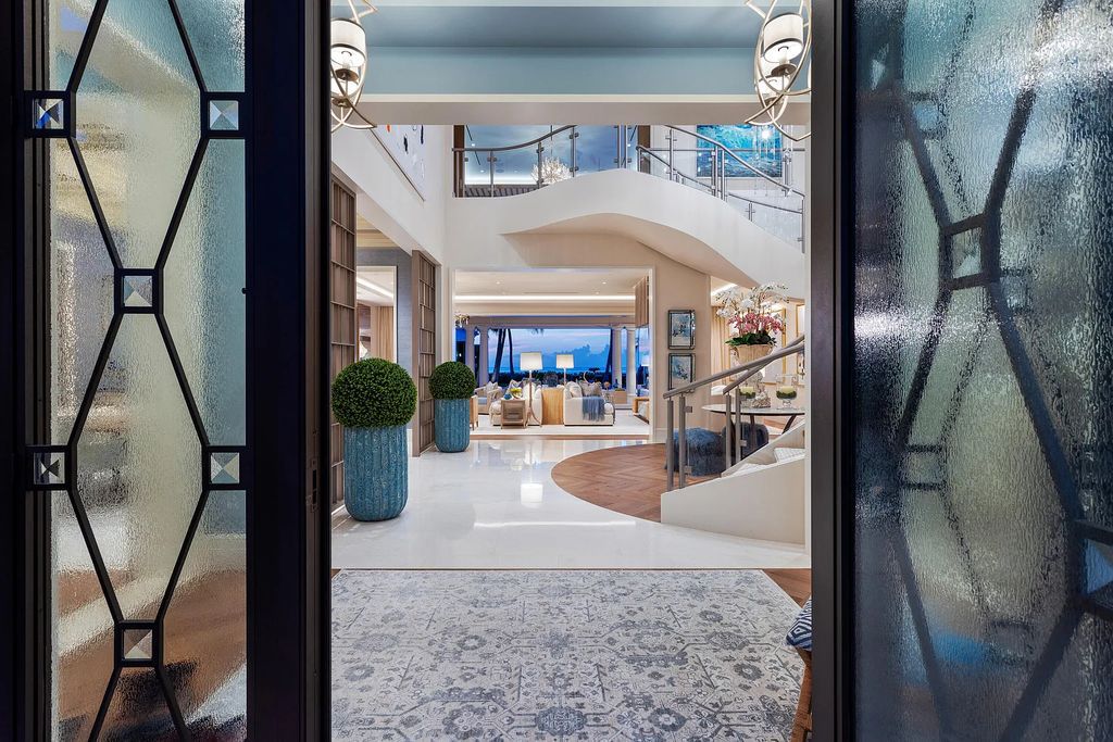 Introducing an extraordinary residence at 701 S Ocean Boulevard in Delray Beach, Florida. Crafted by renowned builder Mark Timothy Luxury Homes and designed by Jeffrey Strasser, this 6-bedrooms, 11-bathrooms masterpiece sets a new standard for luxurious beachfront living.
