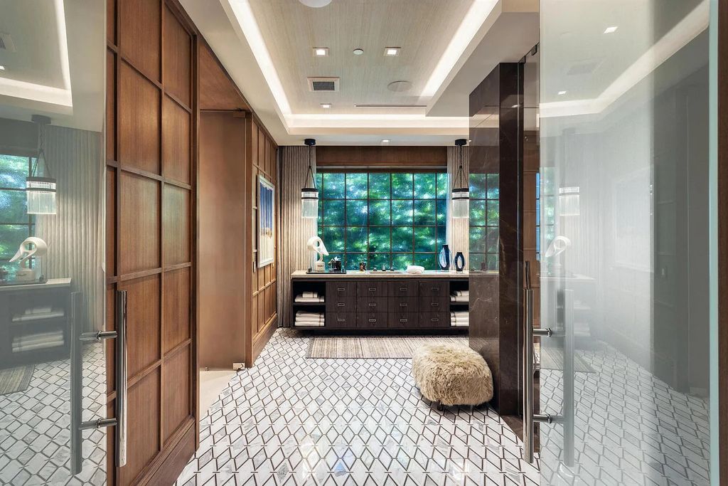Introducing an extraordinary residence at 701 S Ocean Boulevard in Delray Beach, Florida. Crafted by renowned builder Mark Timothy Luxury Homes and designed by Jeffrey Strasser, this 6-bedrooms, 11-bathrooms masterpiece sets a new standard for luxurious beachfront living.