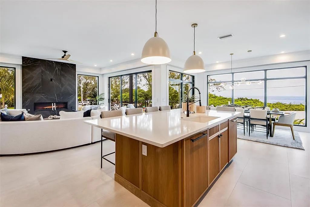 Experience luxury coastal living at 117 N Bay Boulevard, Anna Maria, Florida. This 4-bedrooms, 5-bathrooms, 3,155 square feet bayfront estate is a masterpiece of elegance.