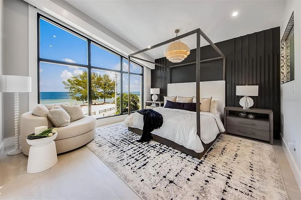 Experience luxury coastal living at 117 N Bay Boulevard, Anna Maria, Florida. This 4-bedrooms, 5-bathrooms, 3,155 square feet bayfront estate is a masterpiece of elegance.