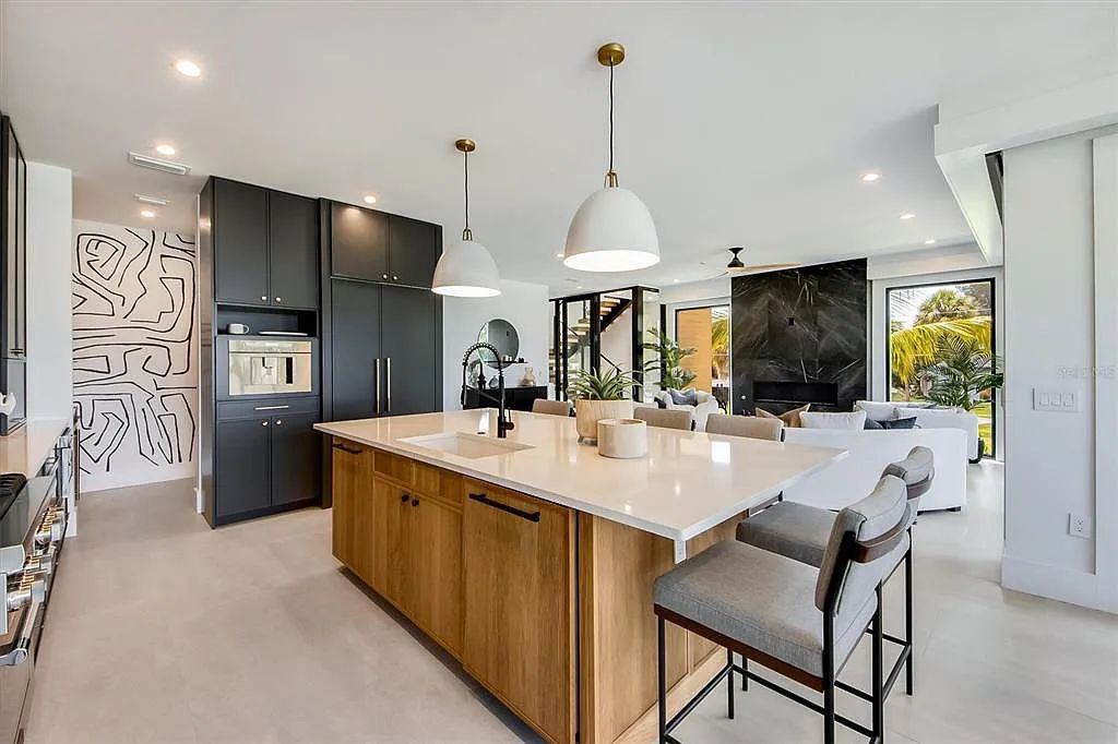 Experience luxury coastal living at 117 N Bay Boulevard, Anna Maria, Florida. This 4-bedrooms, 5-bathrooms, 3,155 square feet bayfront estate is a masterpiece of elegance.