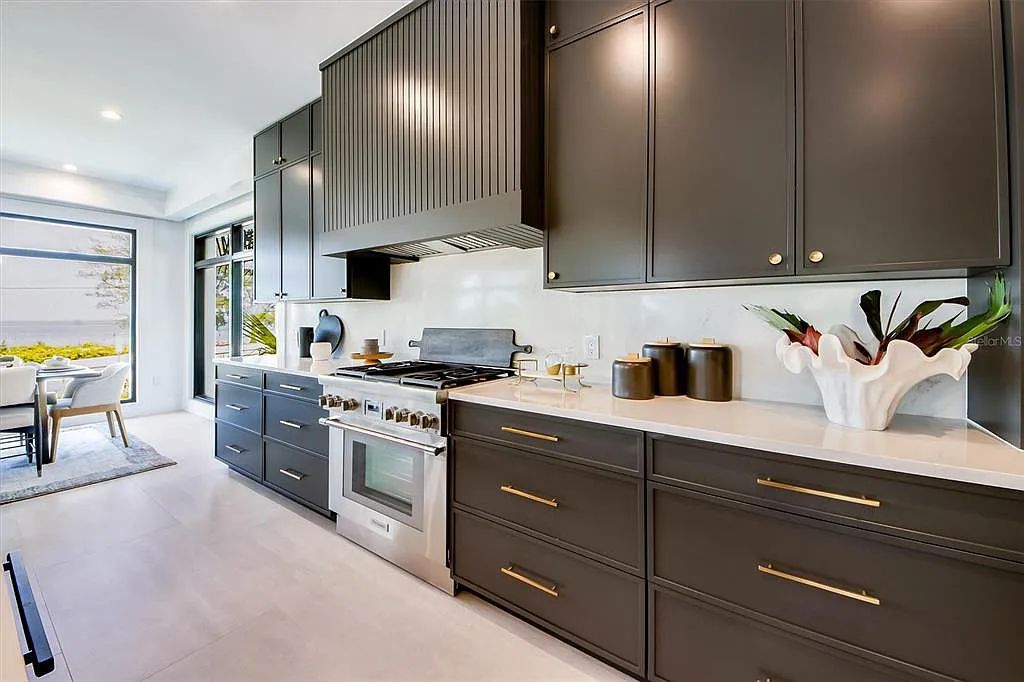 Experience luxury coastal living at 117 N Bay Boulevard, Anna Maria, Florida. This 4-bedrooms, 5-bathrooms, 3,155 square feet bayfront estate is a masterpiece of elegance.