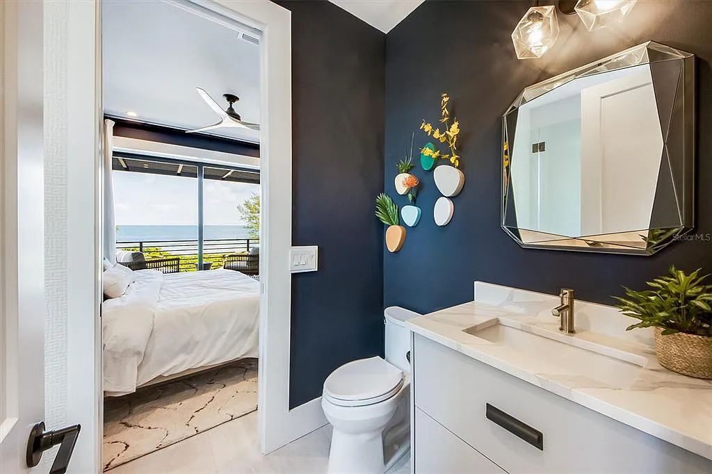 Experience luxury coastal living at 117 N Bay Boulevard, Anna Maria, Florida. This 4-bedrooms, 5-bathrooms, 3,155 square feet bayfront estate is a masterpiece of elegance.