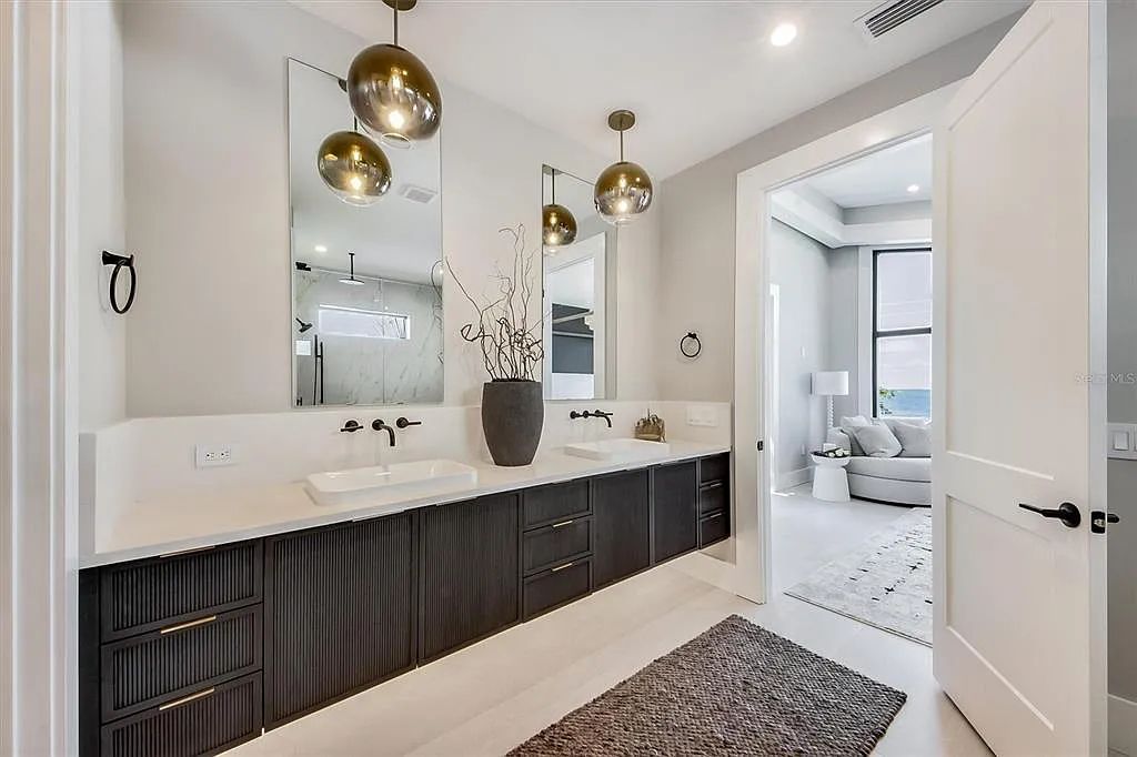 Experience luxury coastal living at 117 N Bay Boulevard, Anna Maria, Florida. This 4-bedrooms, 5-bathrooms, 3,155 square feet bayfront estate is a masterpiece of elegance.