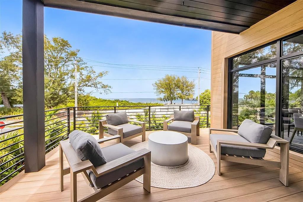 Experience luxury coastal living at 117 N Bay Boulevard, Anna Maria, Florida. This 4-bedrooms, 5-bathrooms, 3,155 square feet bayfront estate is a masterpiece of elegance.