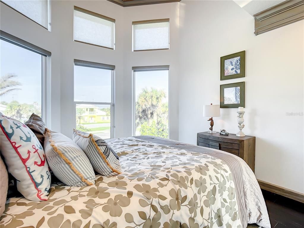 Welcome to 4031 S Atlantic Avenue in Port Orange, Florida - an exquisite beachfront property boasting breathtaking ocean views and a fully renovated design. This gated home offers over 5,300 square feet of living space, featuring 6 bedrooms, 5.5 bathrooms, and an attached in-law suite.