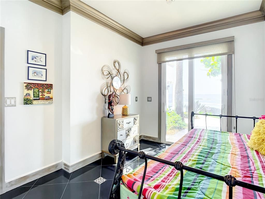 Welcome to 4031 S Atlantic Avenue in Port Orange, Florida - an exquisite beachfront property boasting breathtaking ocean views and a fully renovated design. This gated home offers over 5,300 square feet of living space, featuring 6 bedrooms, 5.5 bathrooms, and an attached in-law suite.