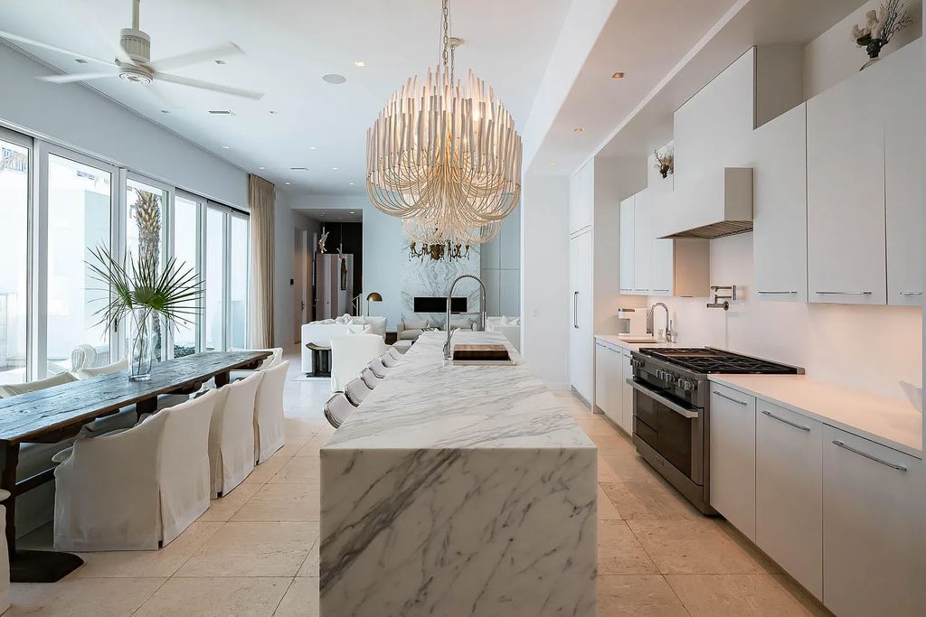 Discover modern living at its finest with this exquisite property at 62 S Charles Street, Inlet Beach, Florida. Built by Boheme Design in 2019, this architectural masterpiece offers 4 beds, 5 baths, and 3,845 sq ft of luxurious living space. Enjoy the peacefulness of Palmera Park and stunning outdoor areas, including a pool with a mesmerizing 32' water wall. Dual primary suites, a gourmet kitchen, and a media room with a wet bar elevate the living experience. Embrace the elegance, convenience, and serenity of this must-see home, complete with access to a private Beach Club.