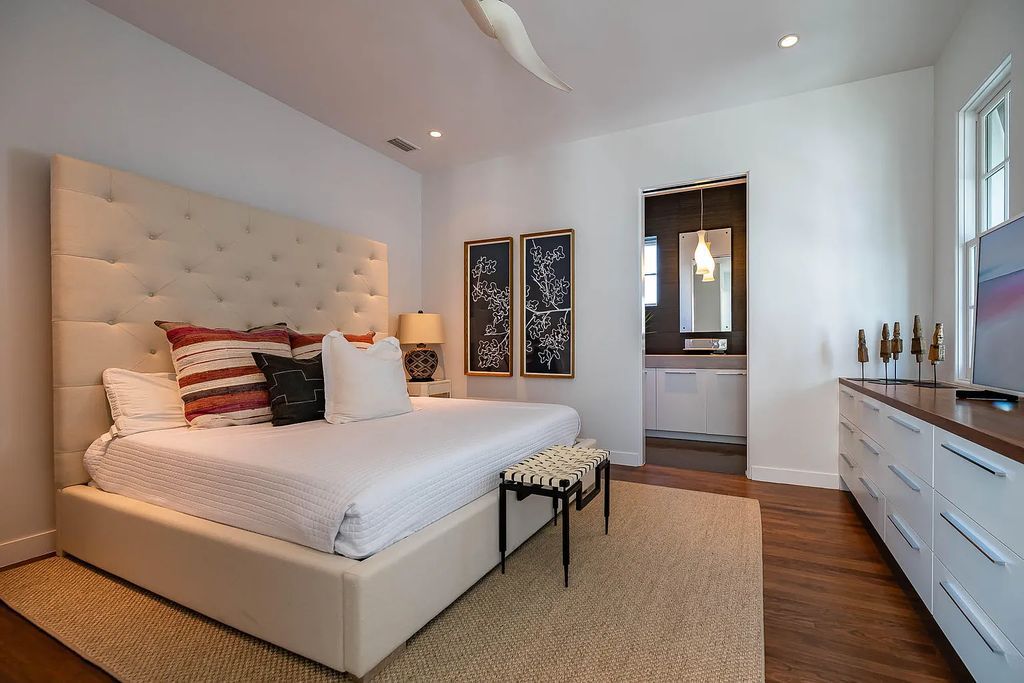 Discover modern living at its finest with this exquisite property at 62 S Charles Street, Inlet Beach, Florida. Built by Boheme Design in 2019, this architectural masterpiece offers 4 beds, 5 baths, and 3,845 sq ft of luxurious living space. Enjoy the peacefulness of Palmera Park and stunning outdoor areas, including a pool with a mesmerizing 32' water wall. Dual primary suites, a gourmet kitchen, and a media room with a wet bar elevate the living experience. Embrace the elegance, convenience, and serenity of this must-see home, complete with access to a private Beach Club.